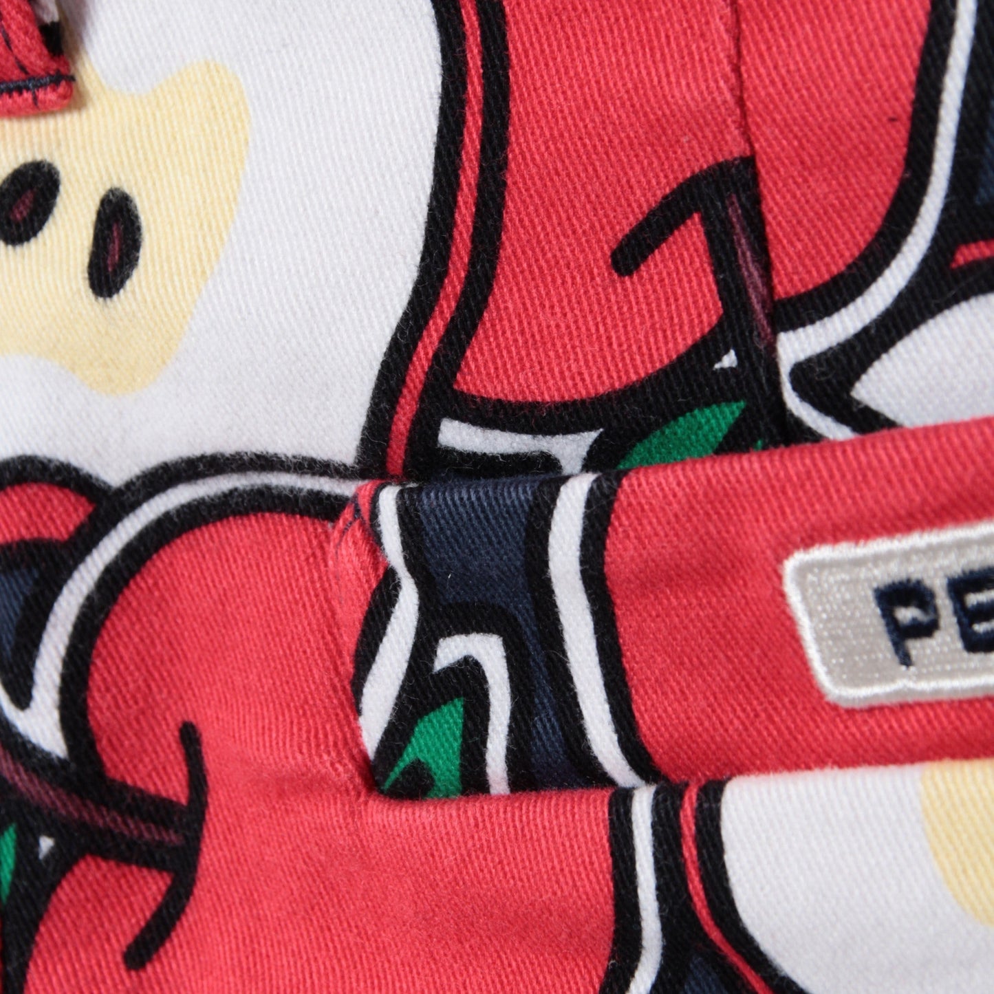 パワフルコットンストレッチ　スノーパウダーピーチ　リンゴプリント　スカート